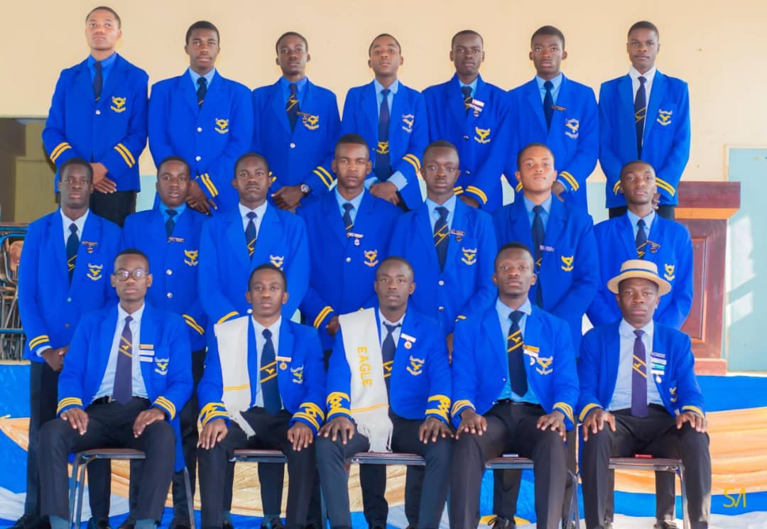 Students in blazers posing for a group portrait